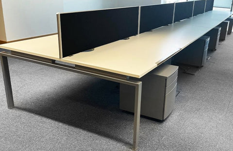6 Person used back to back bench desk system.